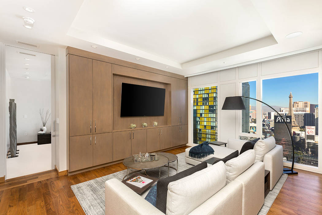 The living room Waldorf Astoria unit No. 2403. (Luxury Estates International)