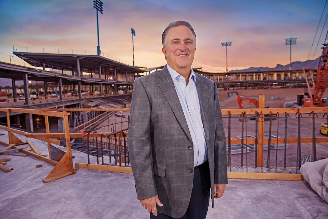 Don Logan, president and chief operating officer of the Las Vegas Aviators, and wife, Jen, are longtime residents of Summerlin. He stands near the construction site of the Las Vegas Ballpark. (Sum ...
