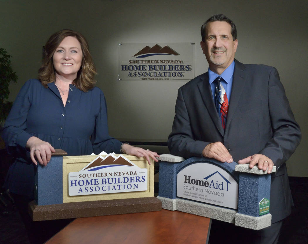 Janet Love, president of the Southern Nevada Homebuilders Association and of StoryBook Homes, and Nat Hodgson, CEO of SNHBA and executive director of HomeAid of Nevada. (Bill Hughes/RJRealEstate.V ...