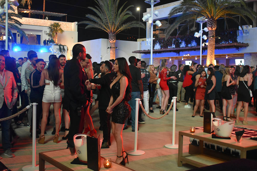 People line up for the grand opening weekend of Kaos, the new dayclub and nightclub at The Palm ...