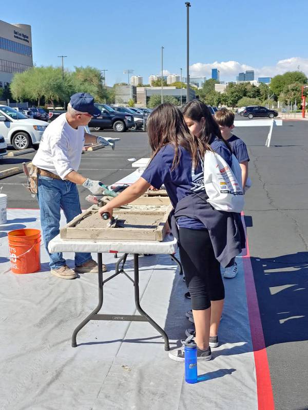 Real estate construction experts gave a May 10 talk to encourage students to enter the field. ( ...