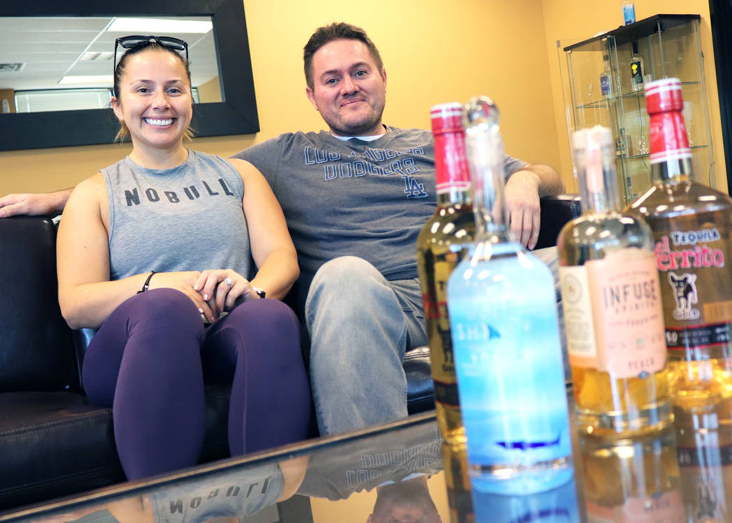 Brother and sister, Jose and Liliana Gonzales manage Las Vegas Tequila Bottling LLC, a family- ...