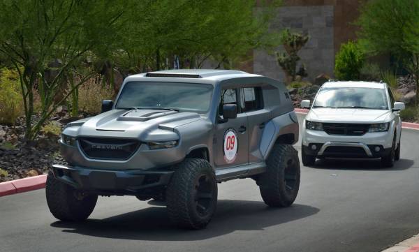 A 2019 Rezvani Tank, left, is shown during the Robb Report Dream Machines Driving Experience at ...