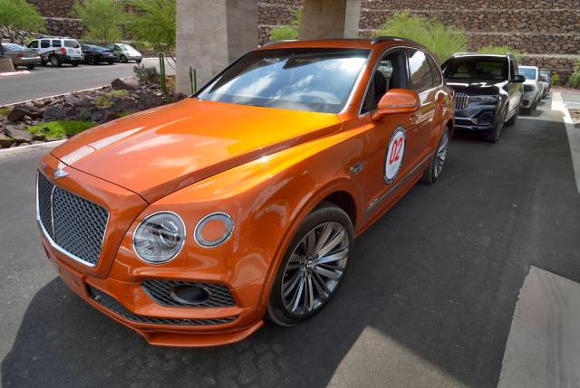 A 2019 Bentley Bentayga Speed is in a line of luxury vehicles during the Robb Report Dream Mach ...