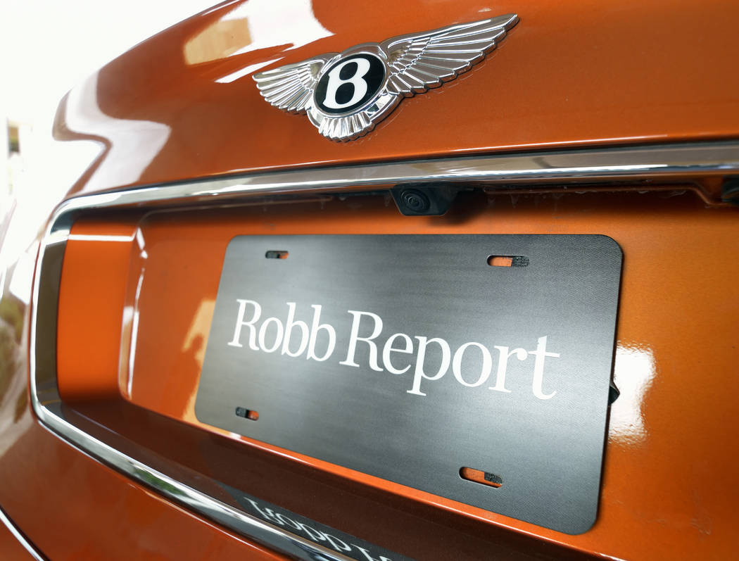The back of a 2019 Bentley Bentayga Speed shows a Robb Report sign. (Bill Hughes/Las Vegas Busi ...