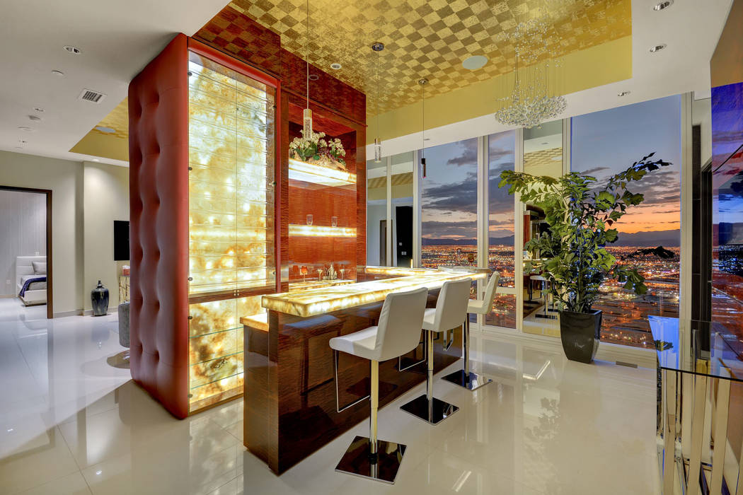 The Waldorf Astoria Presidential Penthouse features a unique translucent Onyx bar. (Award Realty)
