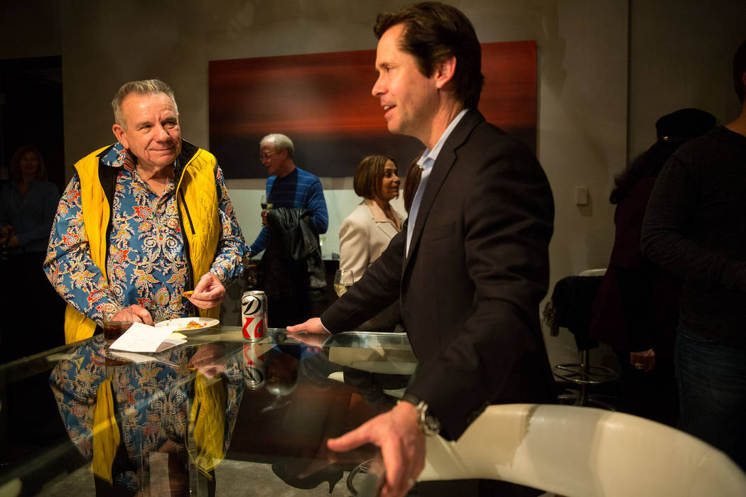 Lacy Harber, left, talks with his attorney, David Keese, center, following an auction of three ...