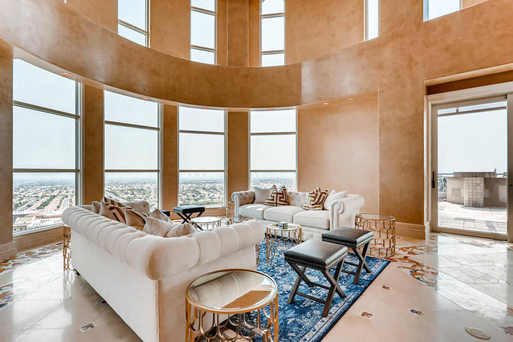 The living room has sweeping views of the Las Vegas Strip. (Char Luxury Real Estate)