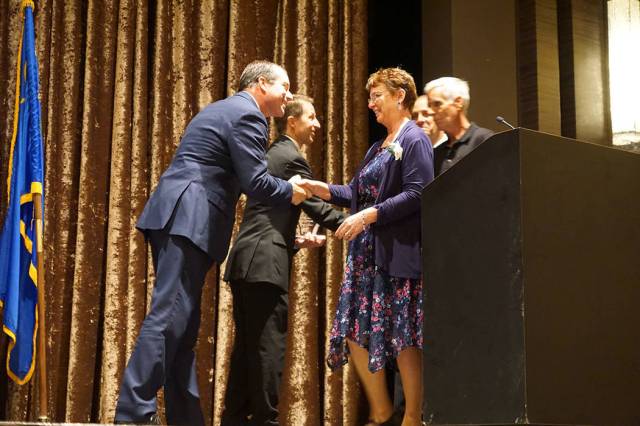 Bonnie Roberts with Bonnie’s Floral Boutique won the customer service award. From left to rig ...