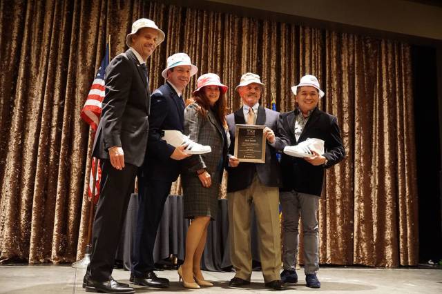 Rick Smith accepts The Noble Award. From left, Scott Muelrath, Henderson Chamber; John Ramous, ...