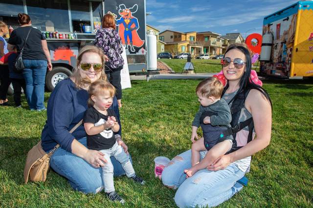 Families enjoyed the food trucks and other activities at Cadence's fifth anniversary party in m ...
