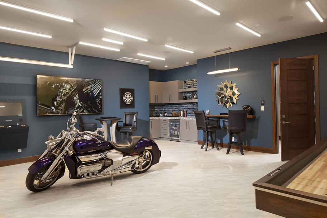 One of the two garages can be used as a man cave. (Jeffrey A. Davis Photography Inc.)