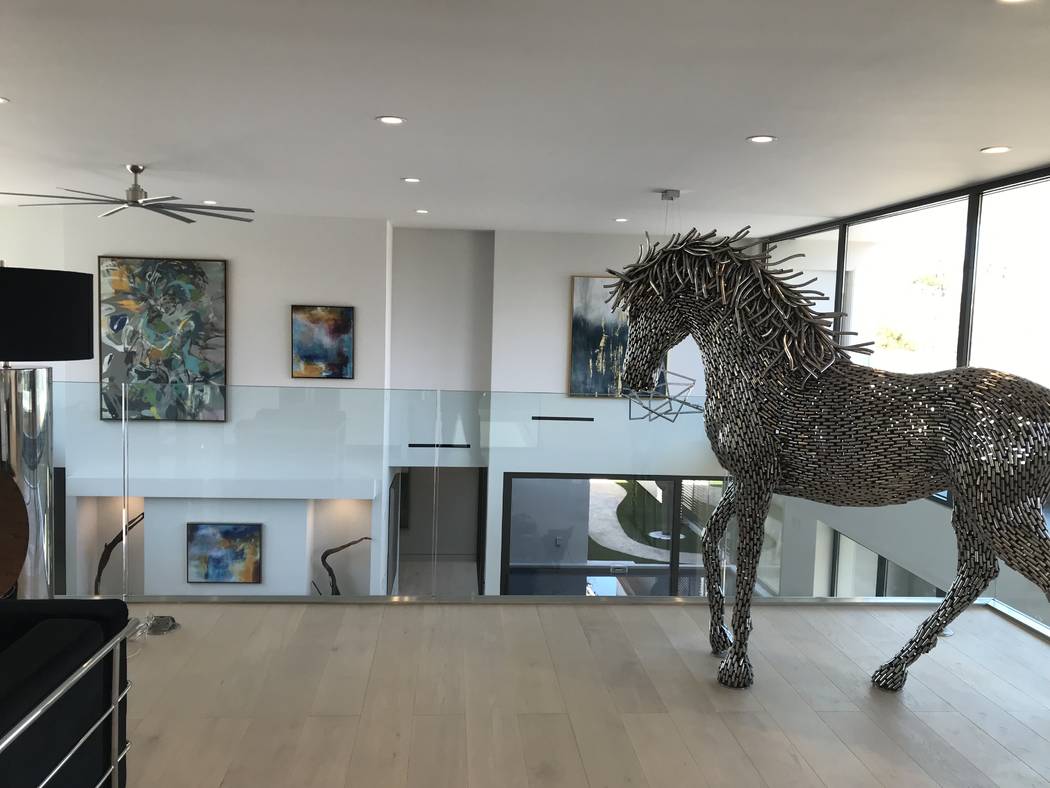 A horse sculpture on the second floor is part of the staging of the home. (Kimberly Joi McDonald)
