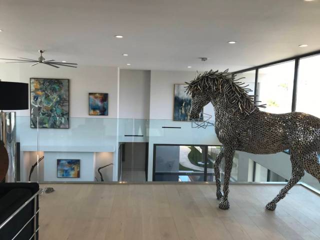 A horse sculpture on the second floor is part of the staging of the home. (Kimberly Joi McDonald)
