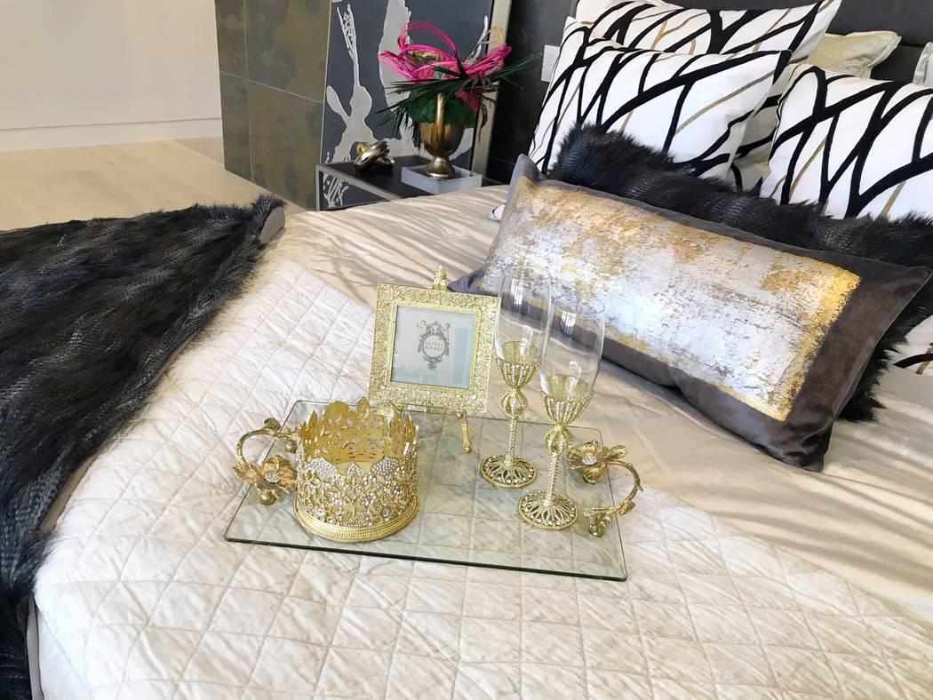 The bedrooms were carefully staged for the World Market Center winter home furnishings’ show. ...