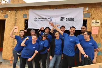 City National Bank colleagues take part in Habitat for Humanity Las Vegas' project with two hom ...