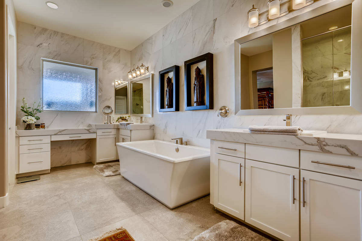 The home includes a large master bath adjacent to the master suite. It has a large soaking tub. ...