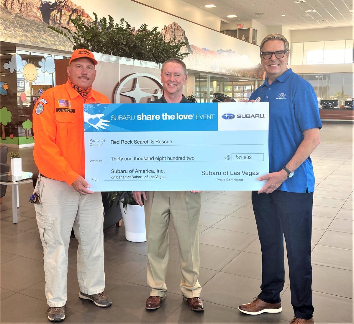 Subaru of America Inc. and Findlay’s Subaru of Las Vegas presented a check for $31,802 to Red ...