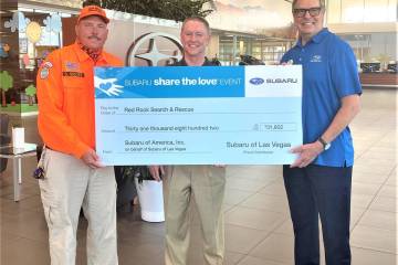 Subaru of America Inc. and Findlay’s Subaru of Las Vegas presented a check for $31,802 to Red ...