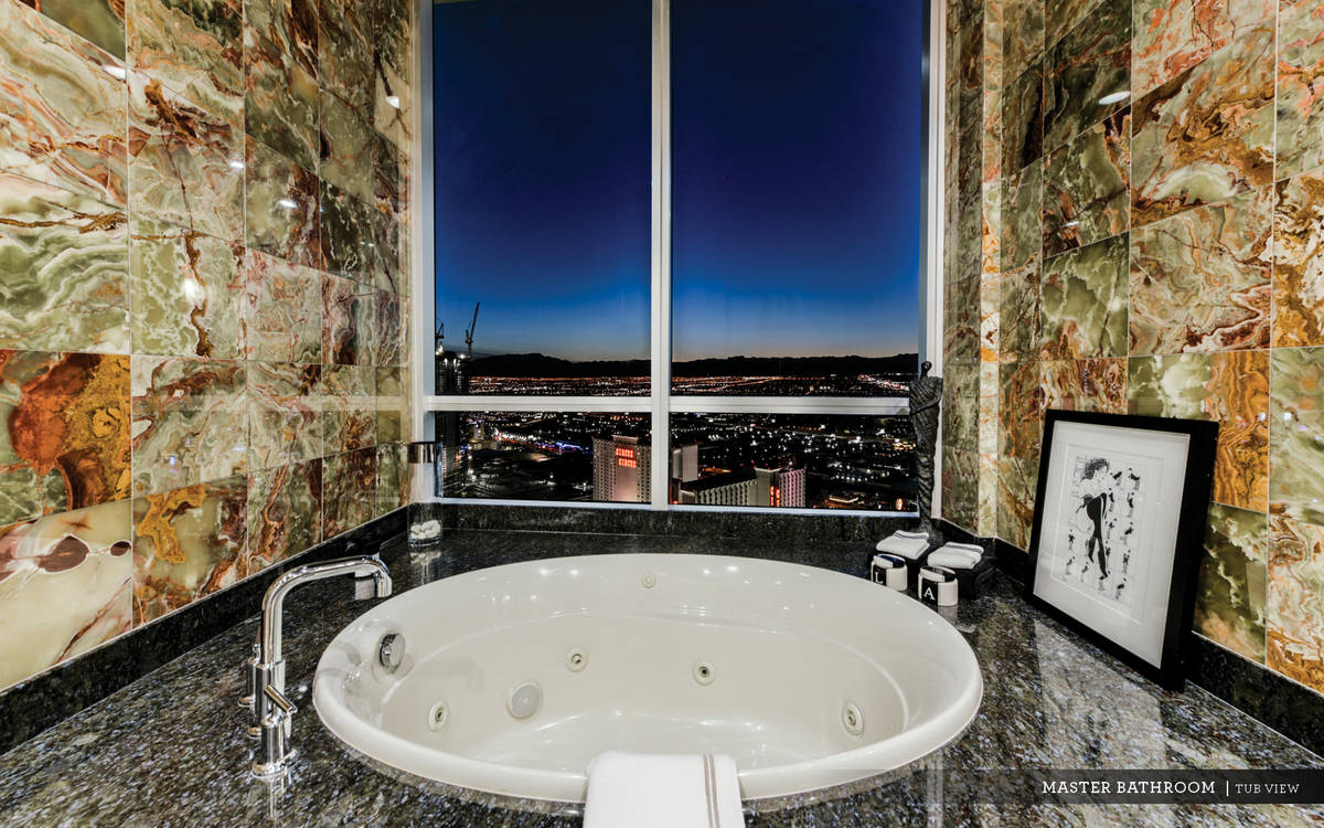 The spa-like master bath has a soaking tub. (Ivan Sher Group)