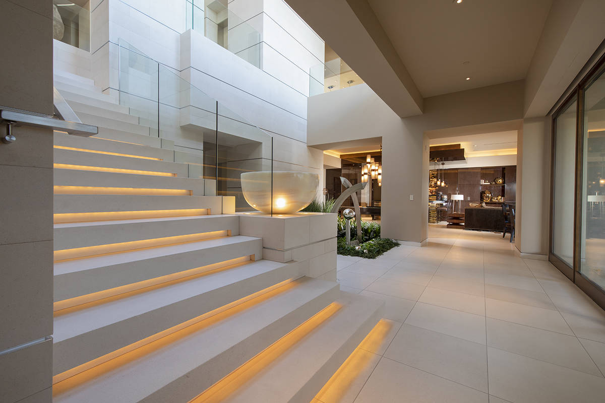 The stairs of the home. (Synergy Sotheby’s International Realty)