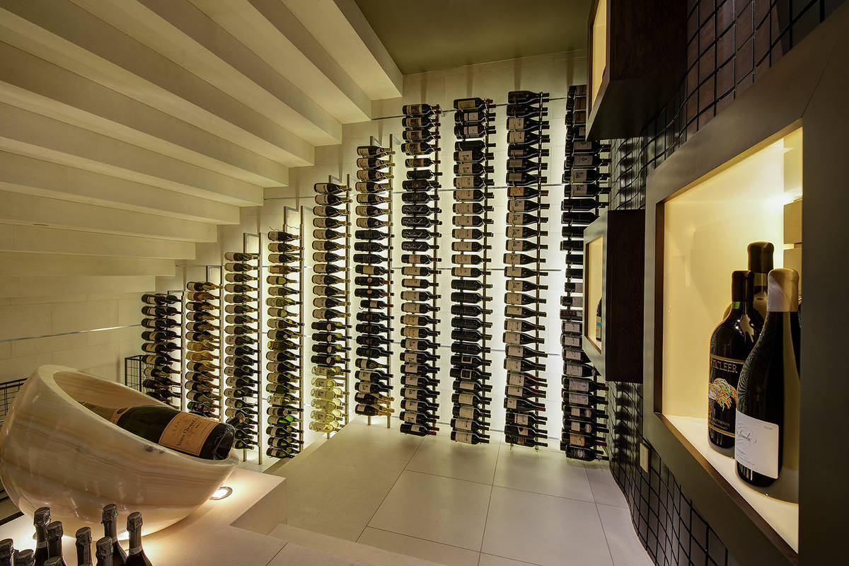 The home was built for entertainment and features a large wine cellar and game room. (Synergy S ...