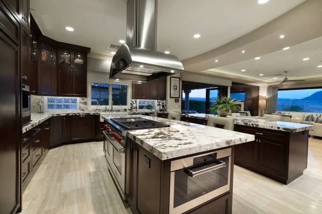 The kitchen has upgraded appliances. (Synergy Sotheby’s International Realty)