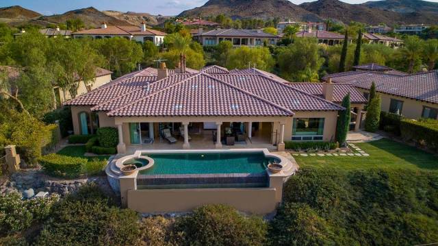 The home has a large pool. (Synergy Sotheby’s International Realty)