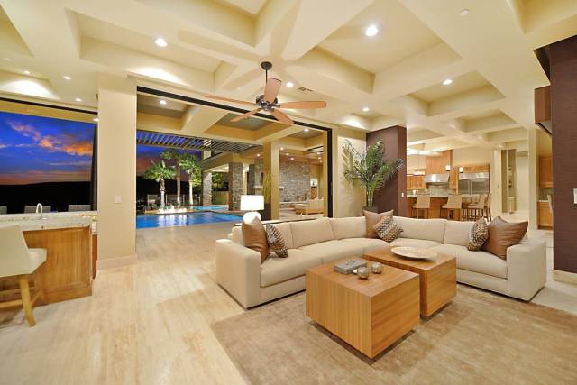 Built in 2015 by Sun West Custom Homes, it measures 11,375 square feet with six bedrooms and ni ...