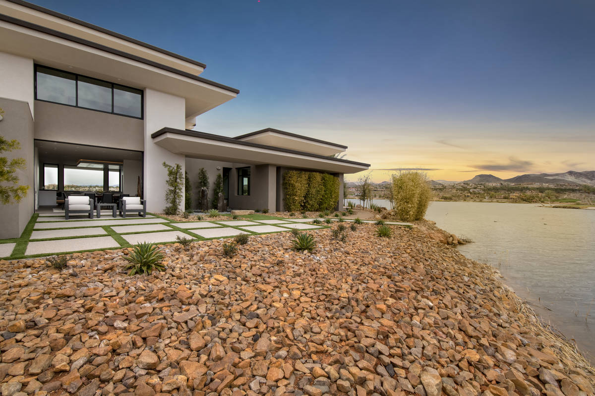 This two-story, 8,838-square-foot Lake Las Vegas custom home was built by the community's man-m ...
