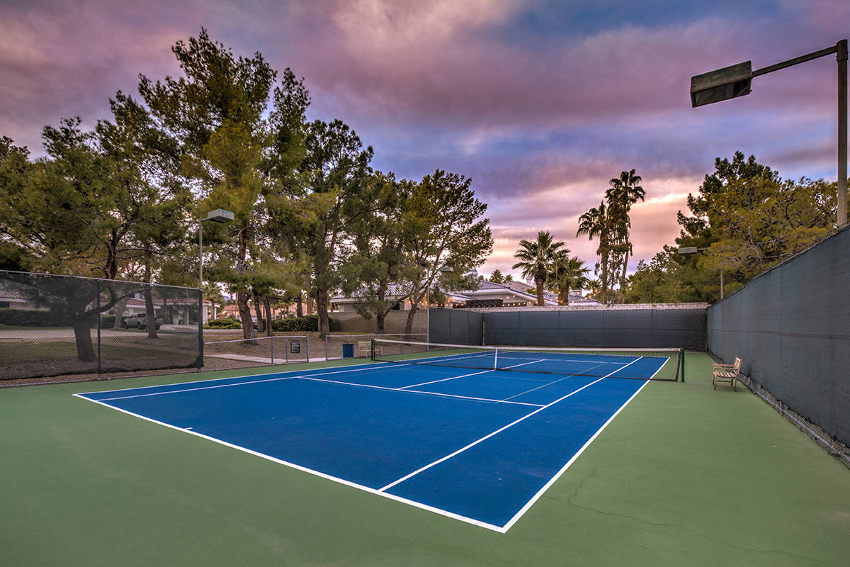 The community has a tennis court. (Mark Wiley Group)