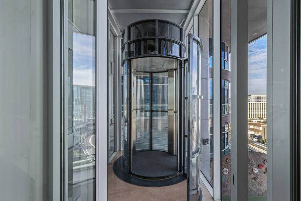 The home features a pneumatic vacuum elevator that connects its three levels. (Red Luxury Real ...