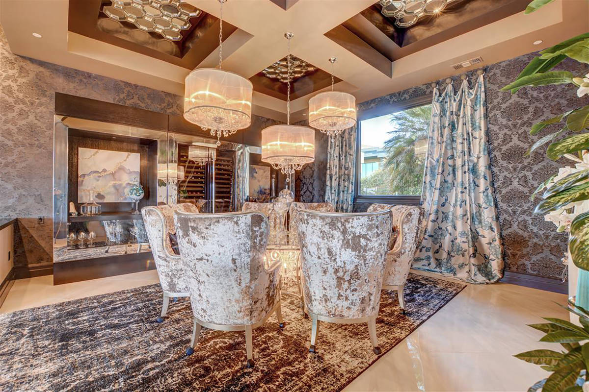The dining room has custom furniture designed by Styles and Allegra box tray ceiling. (Keller ...