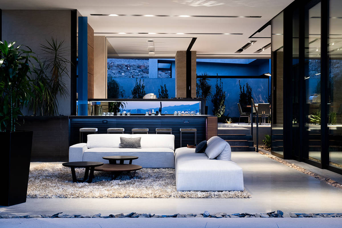 Vegas Modern 001 is a three-level home, which features two master suites with views of the Las ...