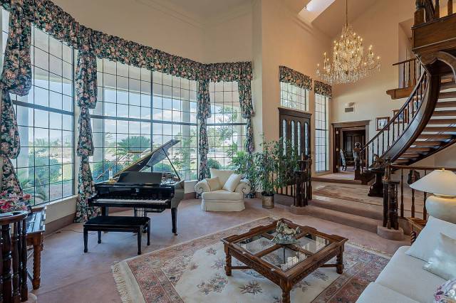 The home features floor-to-ceiling windows. (BHHS)