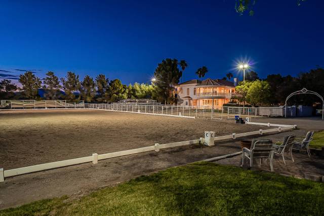 Olympic-sized dressage arena has a training area. (BHHS)