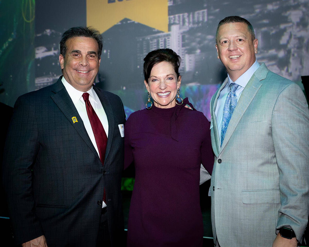 From left, CEO Bank of Nevada John Guedry, Vegas Chamber President and CEO Mary Beth Sewald and ...