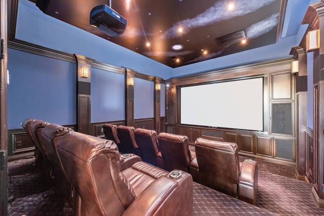 BHHS The nine-seat home movie theater is on the first level near the entertainment room with a ...