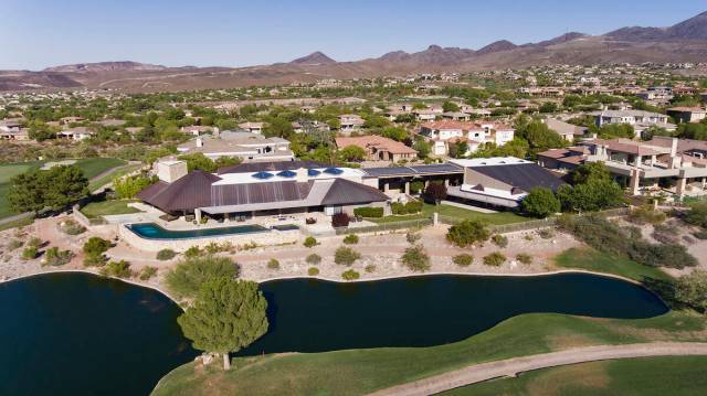 Anthem Country Club sits on 1 acre and measures 15,873 square feet with six bedrooms. It has an ...