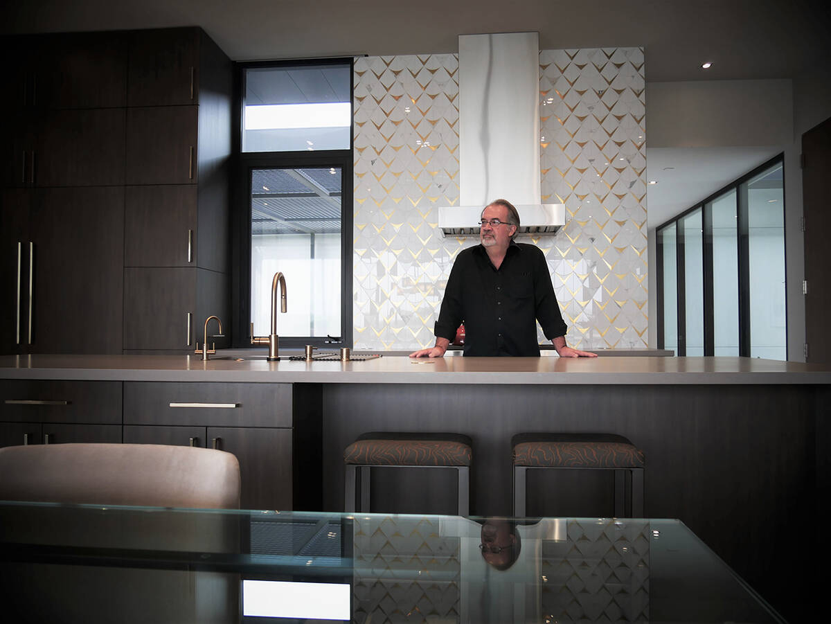 Eric Strain, designer and founding principal of assemblageSTUDIO, created two distinct kitchens ...