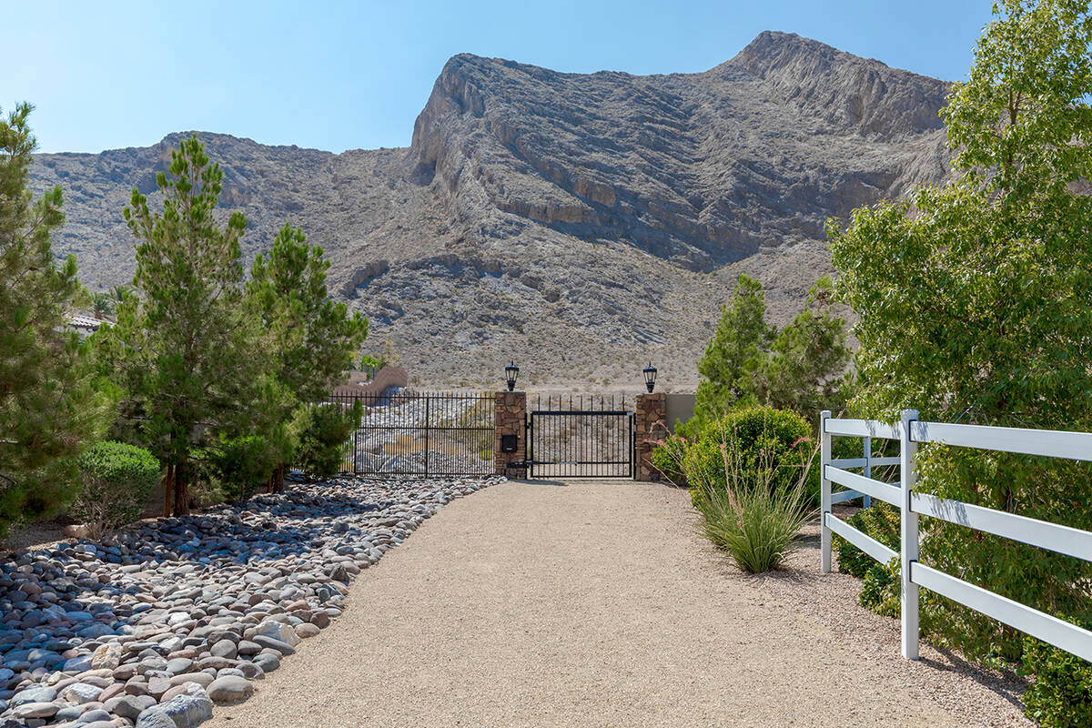 The equestrian-lifestyle paradise with multiple horse corrals has direct access to a 2.3-mile g ...