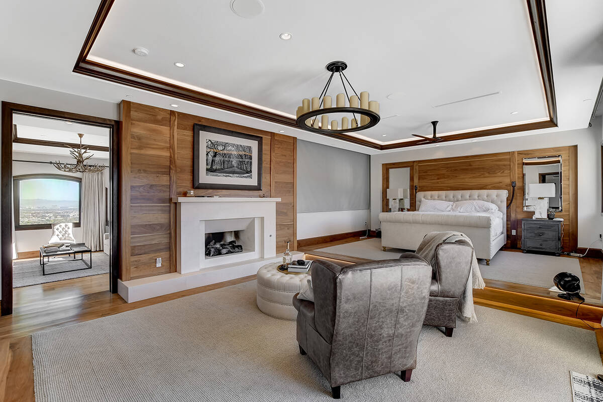Master suite features fireplace. (LVRE)