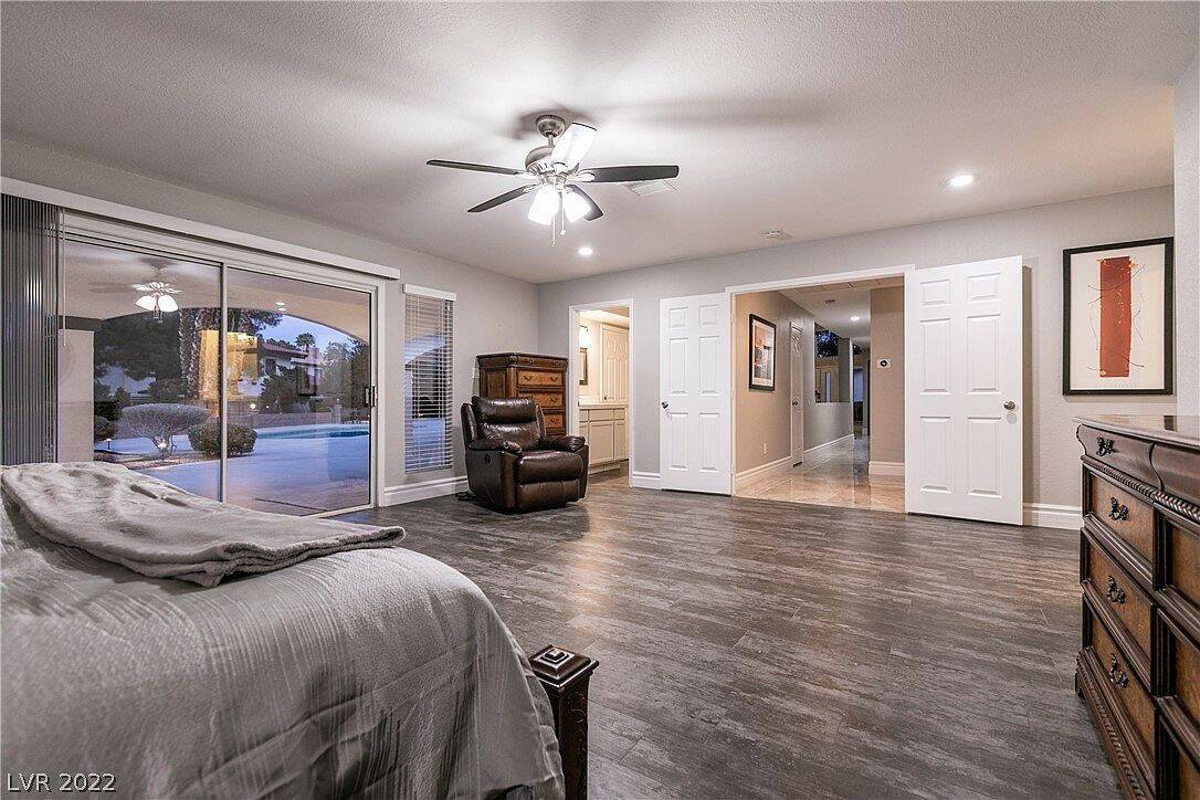 Guest bedroom leads to pool area. (South Bay Realty)