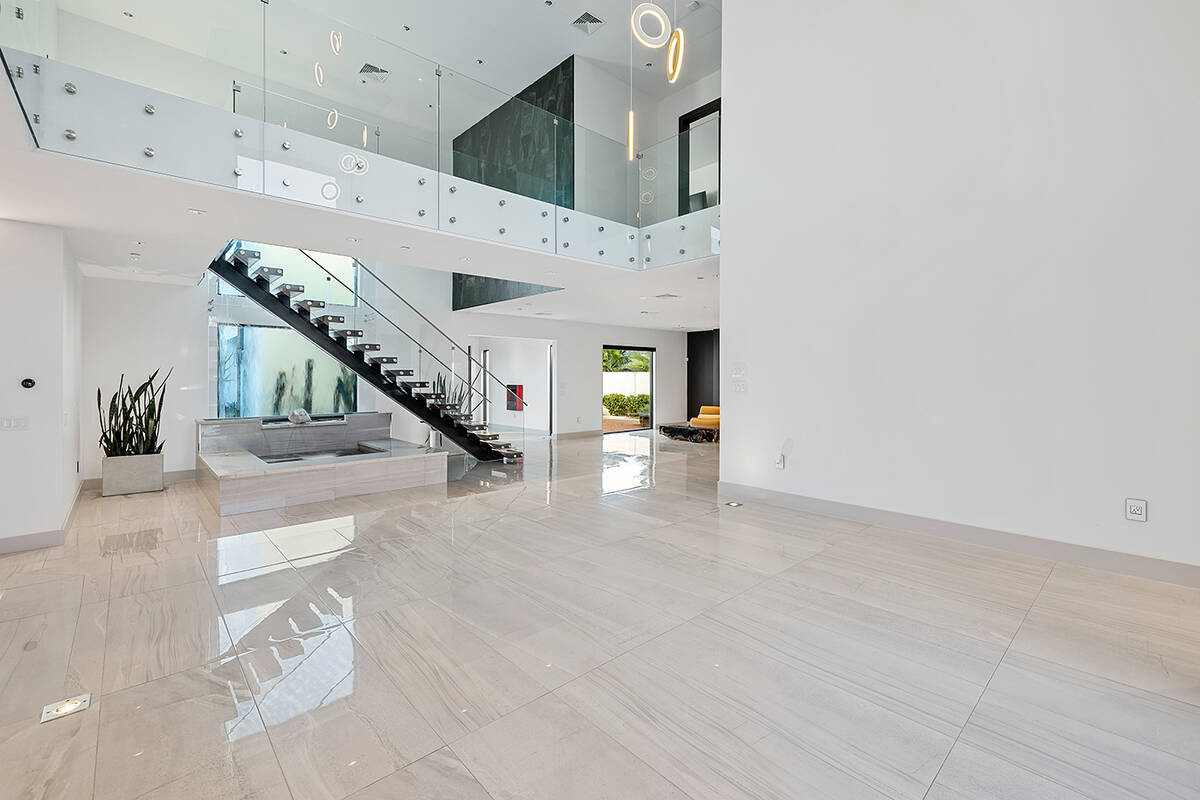 The home features polished porcelain tile flooring. (Napoli Group)