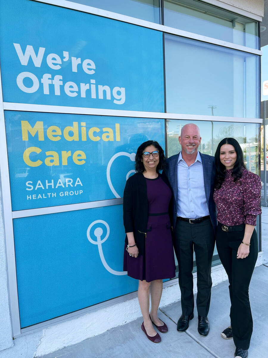 Sahara Health Group owner Dr. Elena Garcia, left, poses with PDS founder and CEO Steve Thorne a ...