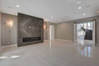 Funk It Up Interiors Las Vegas example of large format tile (marble look) and textured metallic ...