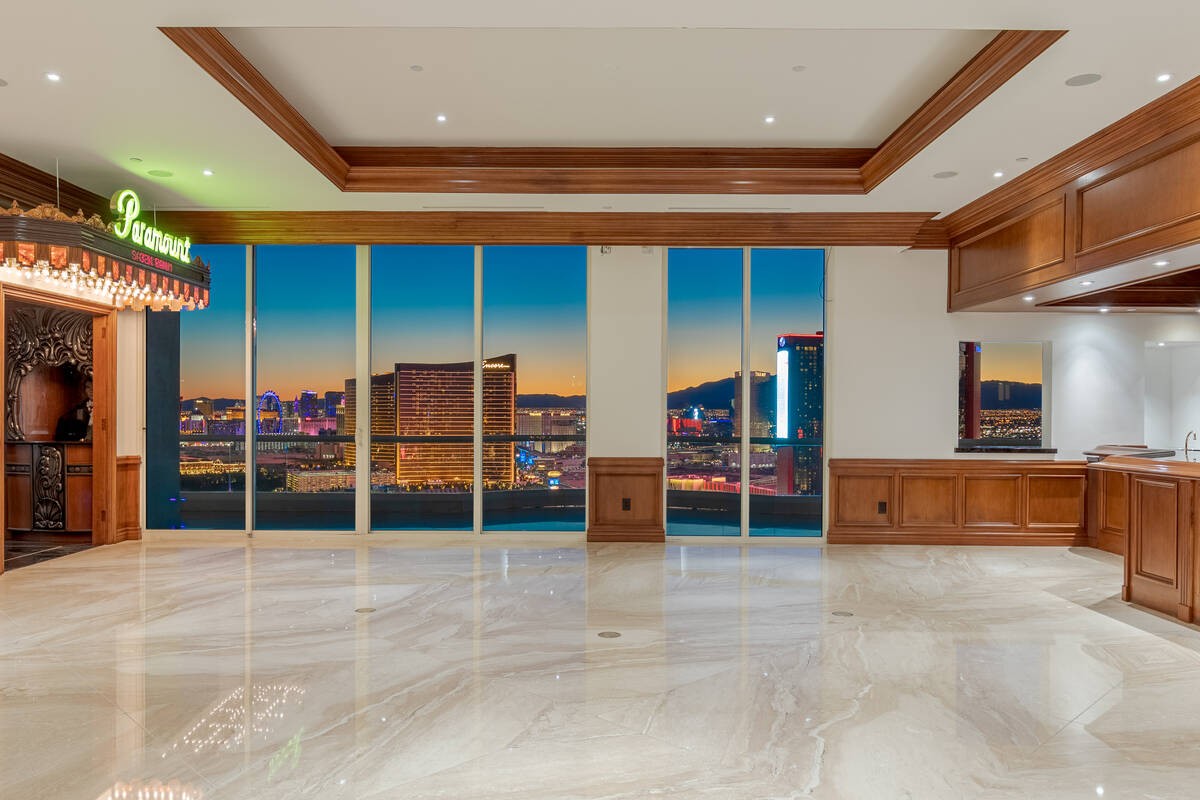 A Turnberry Place penthouse sold for $6.5 million. The home features a theater, wine cellar, pa ...