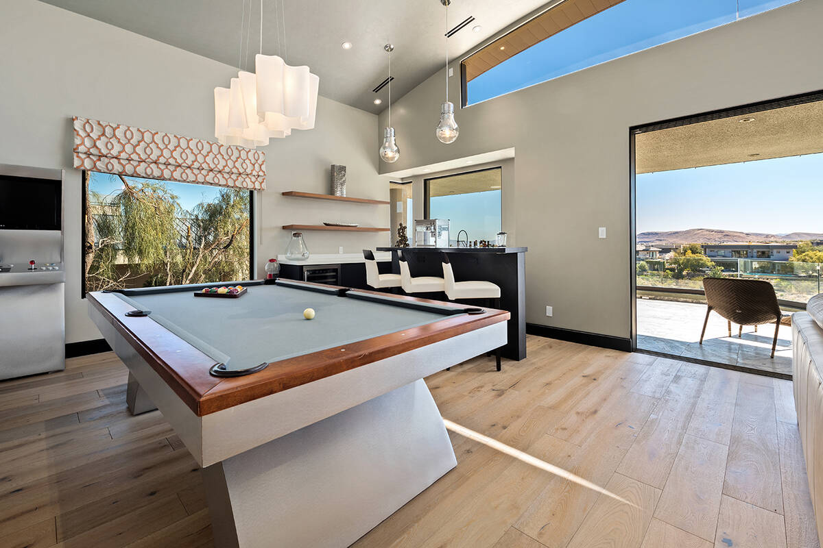 The home has a game room, wine room, gym and sauna. (Simply Vegas)