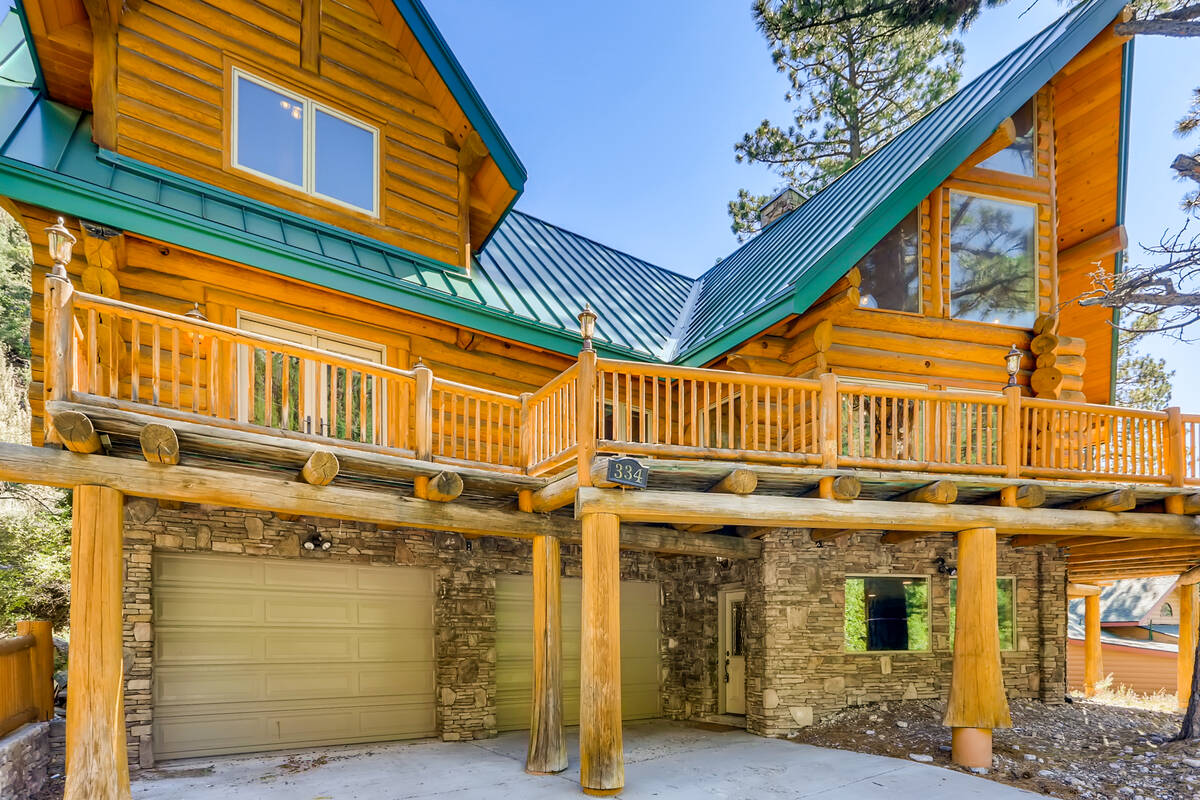 This 4,210-square-foot Mount Charleston cabin is made of handcrafted Western Red Cedar logs. (M ...
