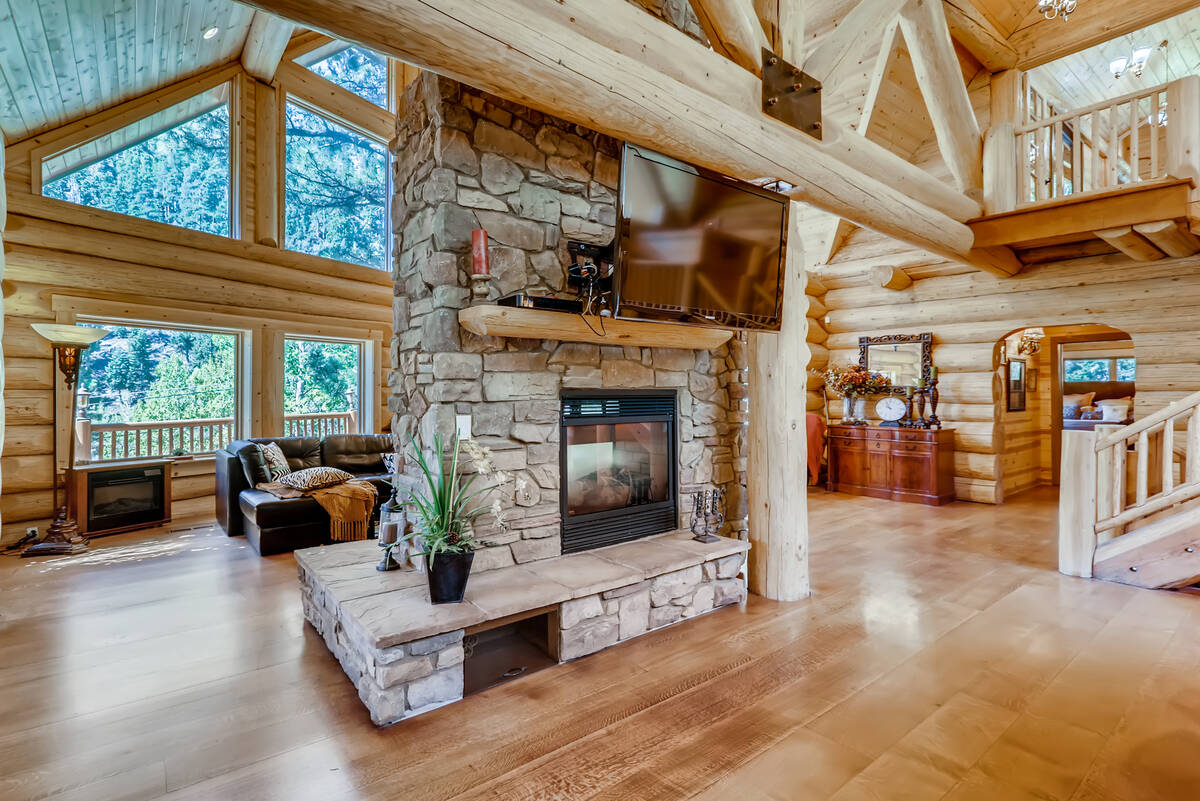 The home features a stone fireplace. (Mt. Charleston Realty)